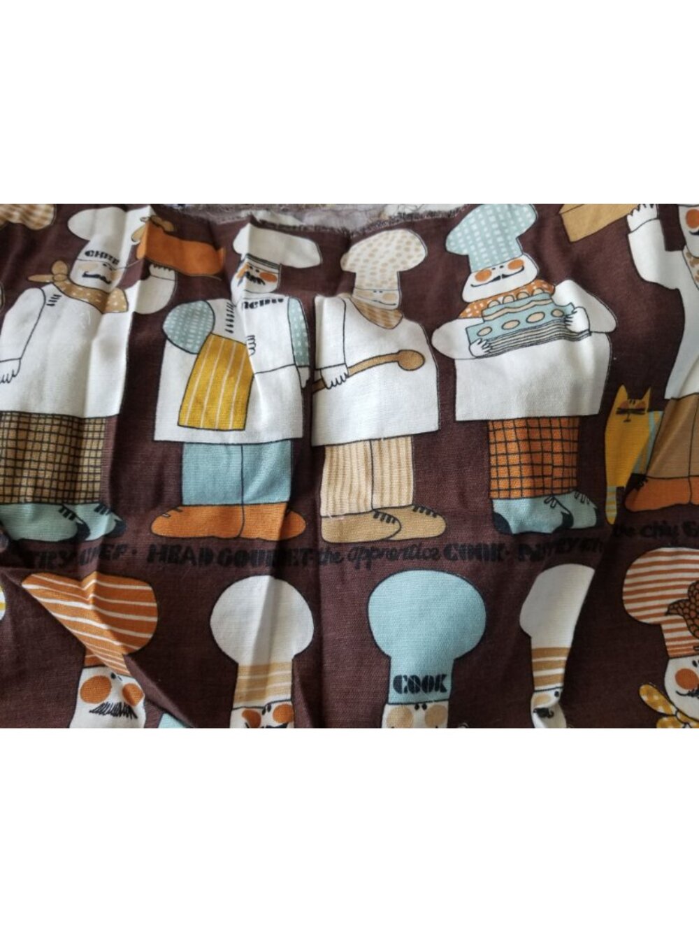Material  Brown Bakers Chef Cake  44" x 19"    Cotton Craft Clothing Joann